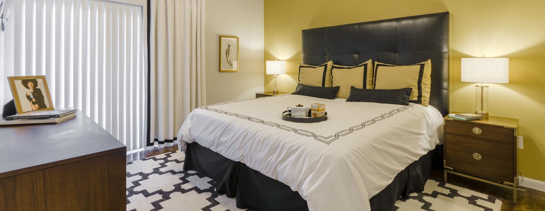 a bedroom with a large bed