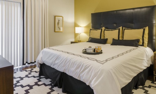 a bedroom with a large bed