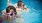 kids swimming in a pool